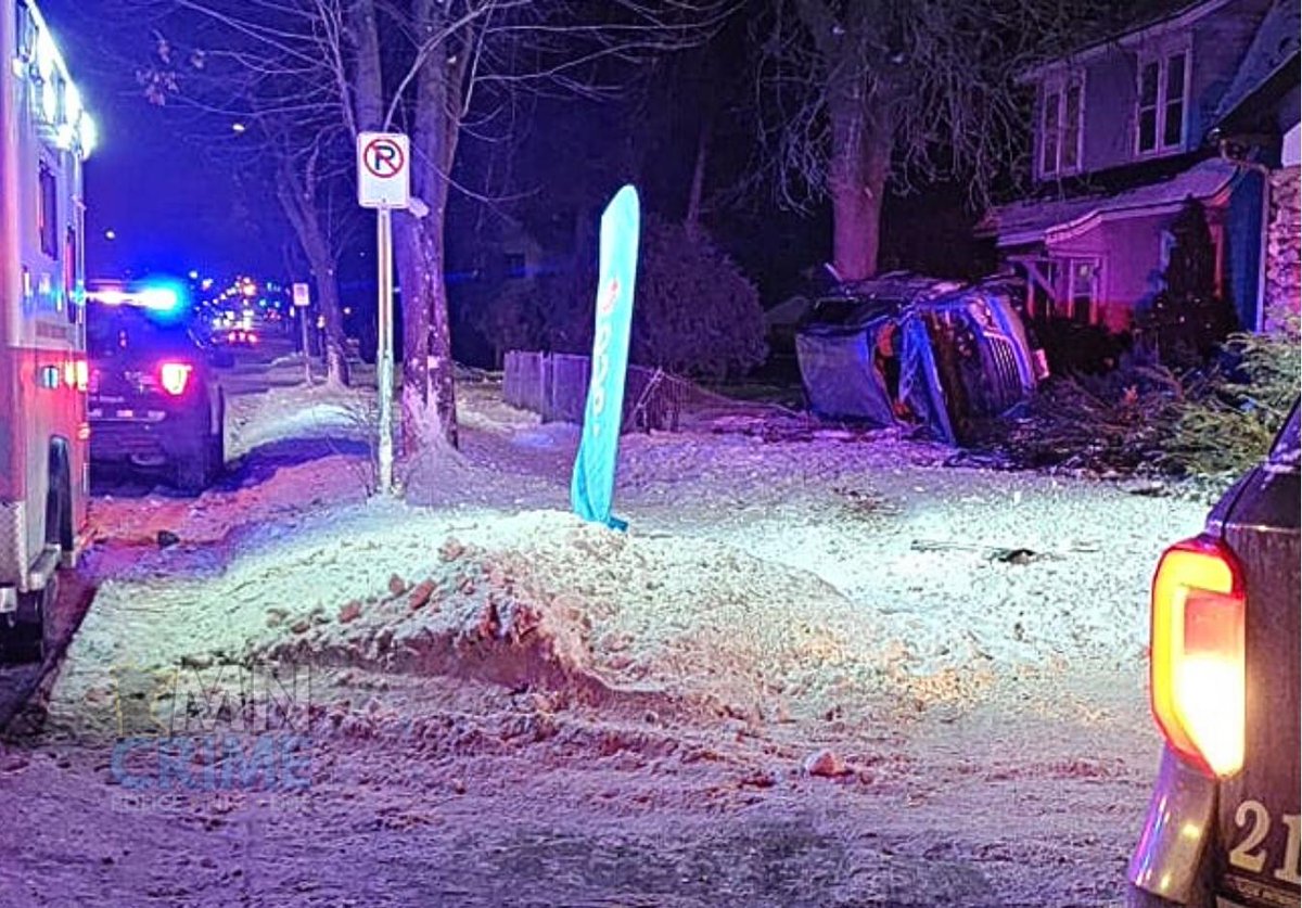 SAINT PAUL: Vehicle rollover near Maryland Ave. E. & Duluth St. - This SUV ended up in the front yard of a house. Medics are on scene and evaluating an occupant for injuries