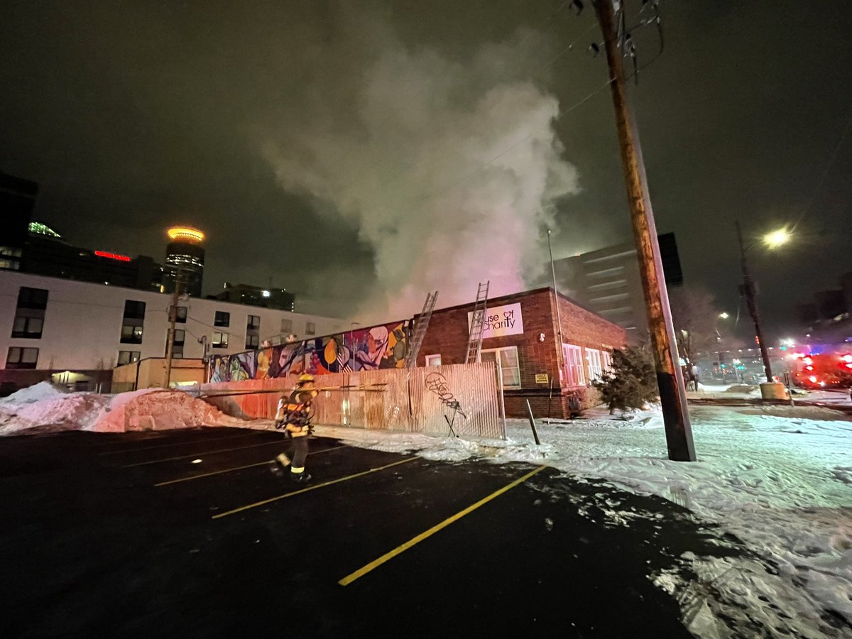 House of Charity across from HCMC aid currently burning in Downtown Minneapolis. @MinneapolisFire is on scene battling the blaze