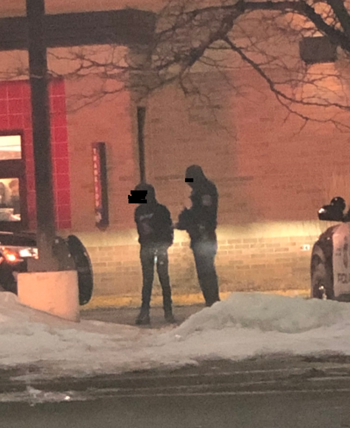 A follower tells us there is/was police activity at a fast food place in Brooklyn Center. Police were surrounding a BMW in the drive-thru and appear to have a person detained in these pics.