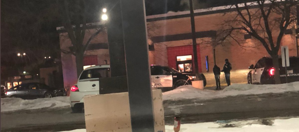 A follower tells us there is/was police activity at a fast food place in Brooklyn Center. Police were surrounding a BMW in the drive-thru and appear to have a person detained in these pics.  