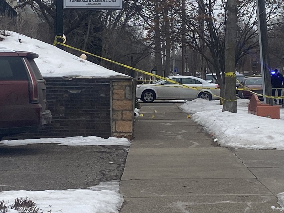 Wabasha Ave in St. Paul taped off for reports of shooting outside funeral home. Crime scene markers on the ground and @sppdmn on scene. 