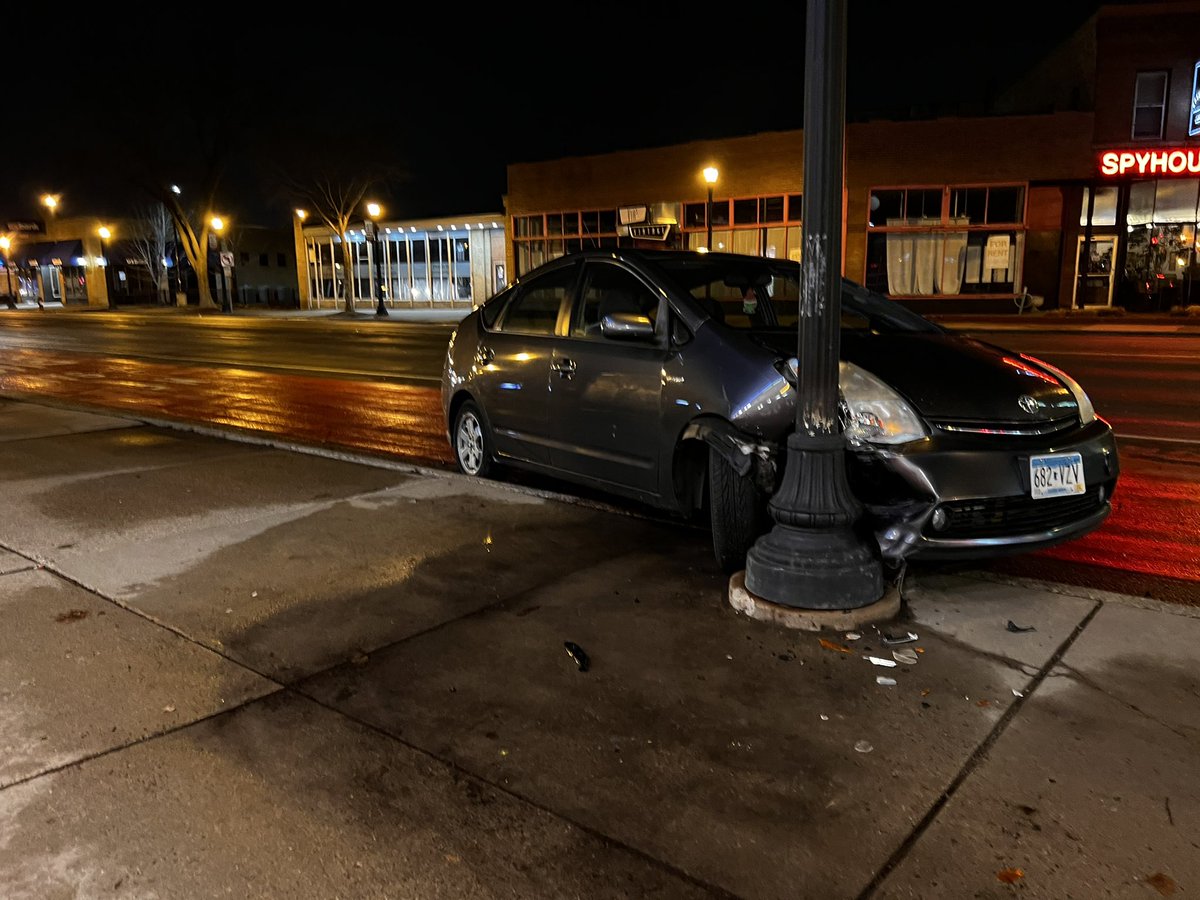 Badly damaged Prius left unattended after driver struck a light pole near Hennepin Ave. & W. 24th St. in Minneapolis