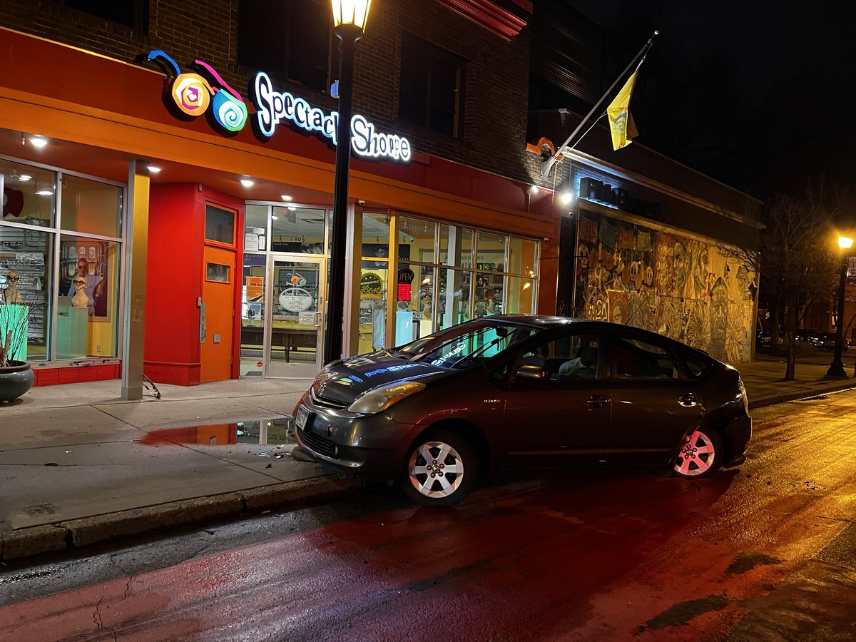 Badly damaged Prius left unattended after driver struck a light pole near Hennepin Ave. & W. 24th St. in Minneapolis