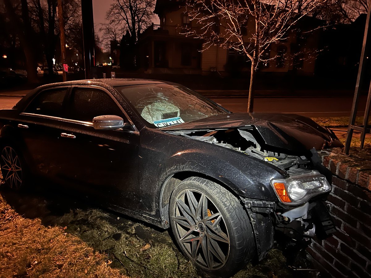 Car crashed into brick wall near W. 24th St. & Pillsbury Ave. in south Minneapolis. Passenger may have hit their head on the windshield based on the damage