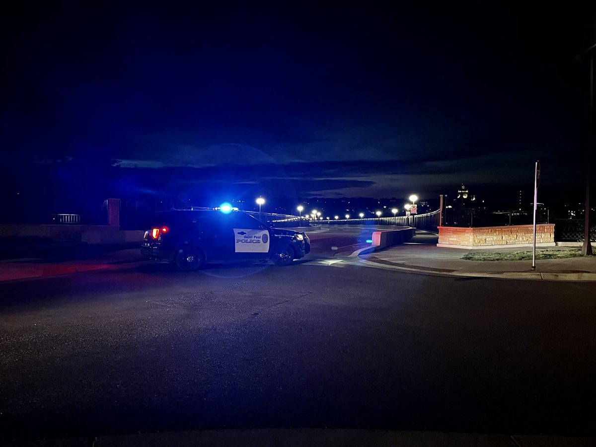 This is the current scene at the foot of the Smith Ave. High Bridge on the Cherokee Heights side. @sppdmn has closed all access to the bridge along with Lilydale Road/Water Street below the bridge. No official word on what is happening from the city