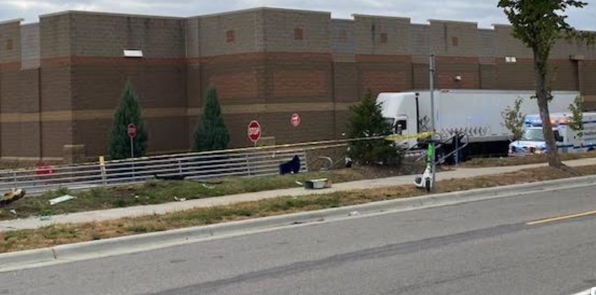 Injury crash behind the Quarry NEMPLS.  blue vehicle pictured ran over trees and a light post on 18th Ave NE, behind Target.  47-year-old male driver, possible seizure, per responders