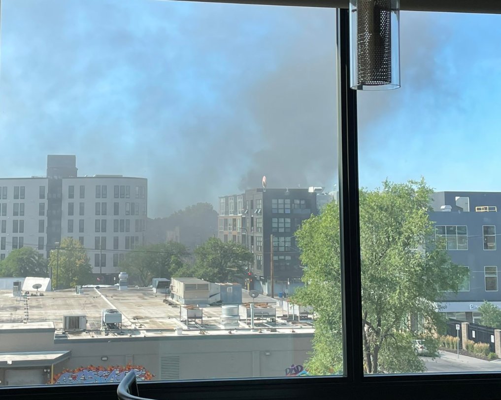 About 10 a.m., possible arson dumpster fire in UptownMpls near Lake and Lagoon. Suspect: BM, tall, bald, black racing or courier shirt, white writing on front/back, black Air Jordan shorts, black/purple shoes on a bike with a gray Adidas bag on back