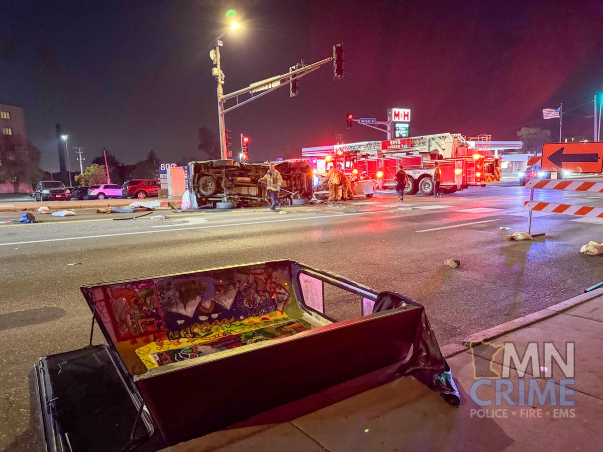 SAINT PAUL: Arcade St. & Minnehaha Ave. - Fire crews are assisting with clearing debris from the roadway after a two vehicle crash. One pickup truck rolled onto its side. Officers reported that one driver fled the scene shortly after the crash