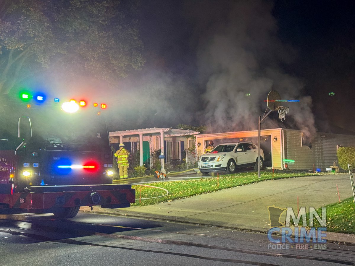 ROSEVILLE: 17xx Lindy Ave. N. - Firefighters are on scene at a home with heavy fire showing from an attached garage. Crews are stretching lines for fire attack. Searches of the home have been completed and are clear. Fire crews report the fire has extended into the attic space