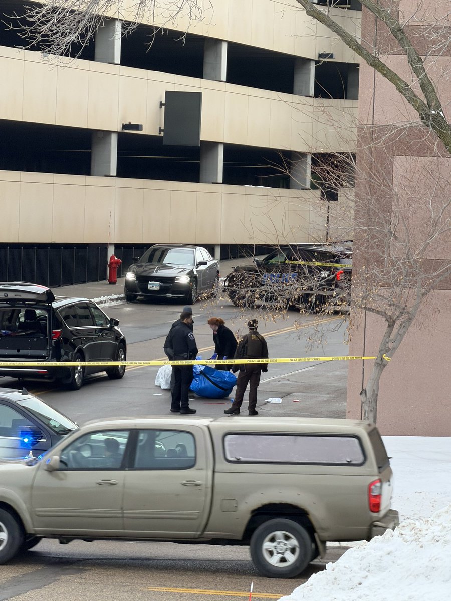 Large police presence in St Louis Park: St. Louis Park police officers responded to a report of a male down in the roadway at the base of a parking structure on Duke Drive near Gamble Drive in St. Louis Park.