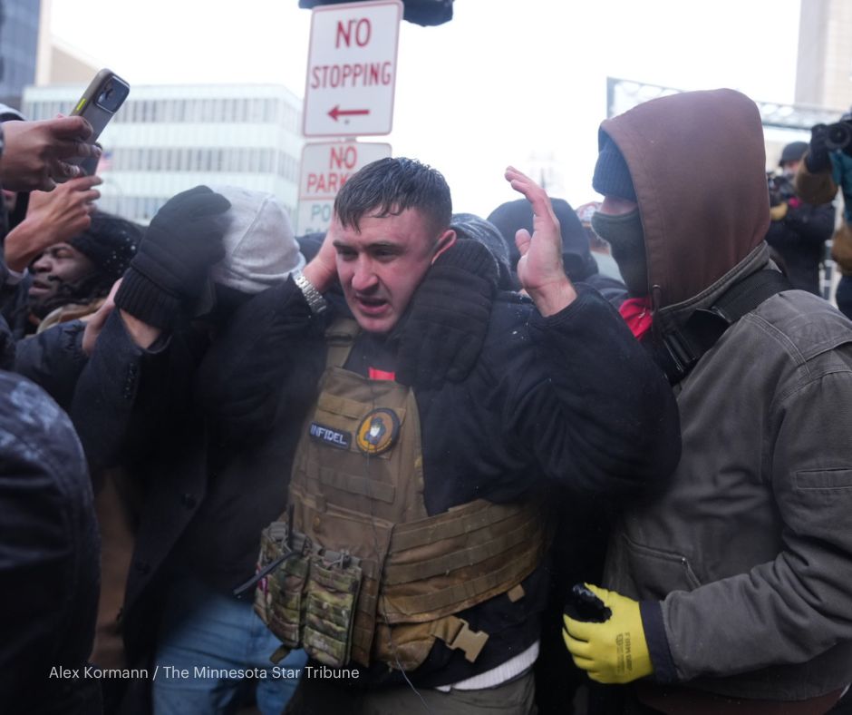 Groups from competing protests confronted each other in downtown Minneapolis Saturday as police tried to keep them separated 