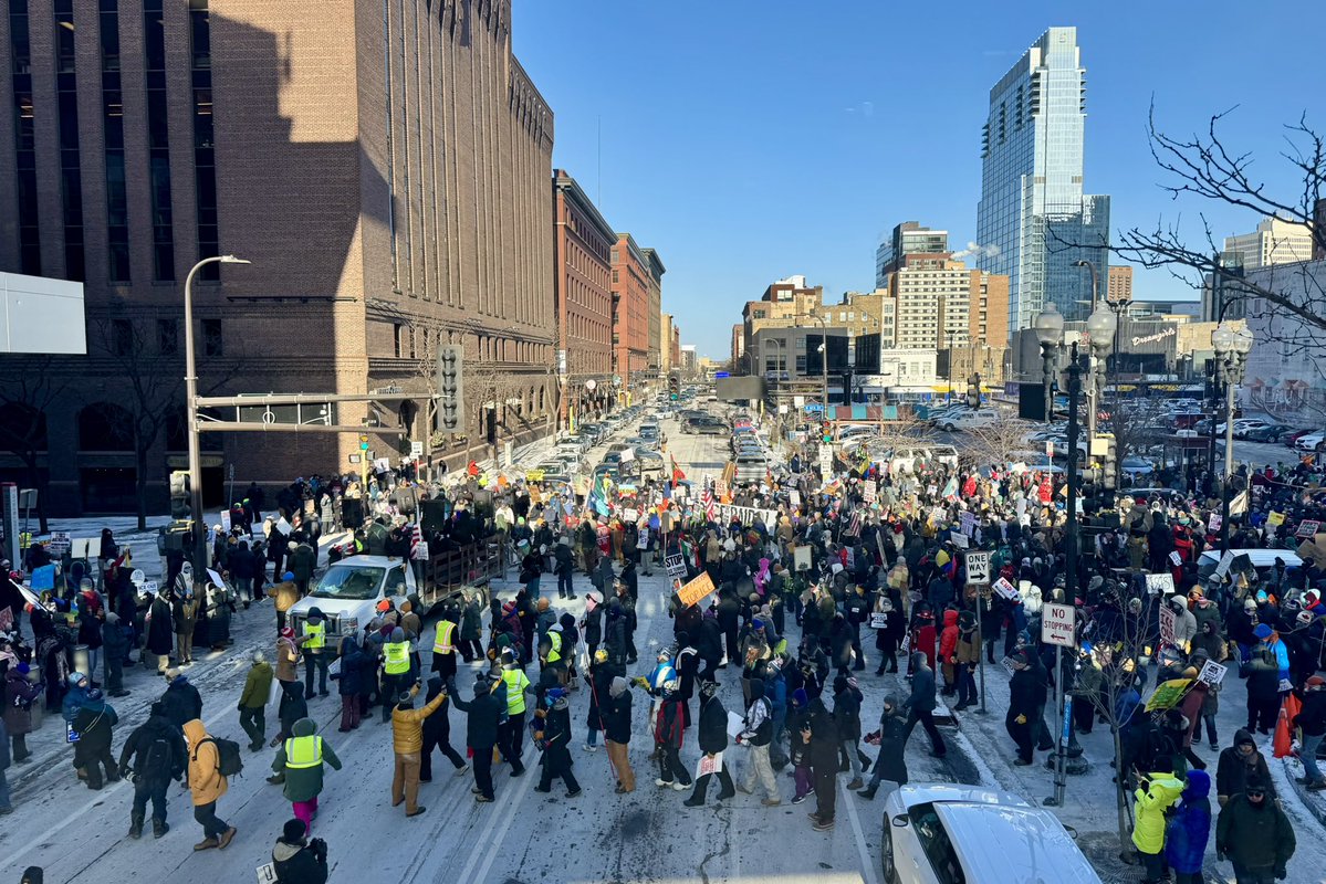 A massive crowd has converged at the Target Center downtown after a march from Commons Park, one of several “Day of Action” protests today in the metro. They’re calling for an end to the Immigration and Customs Enforcement surge, which has seen several thousand